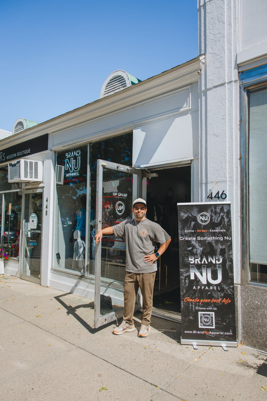Marcello outside the Brand Nu Apparel flagship at 446 Main Street